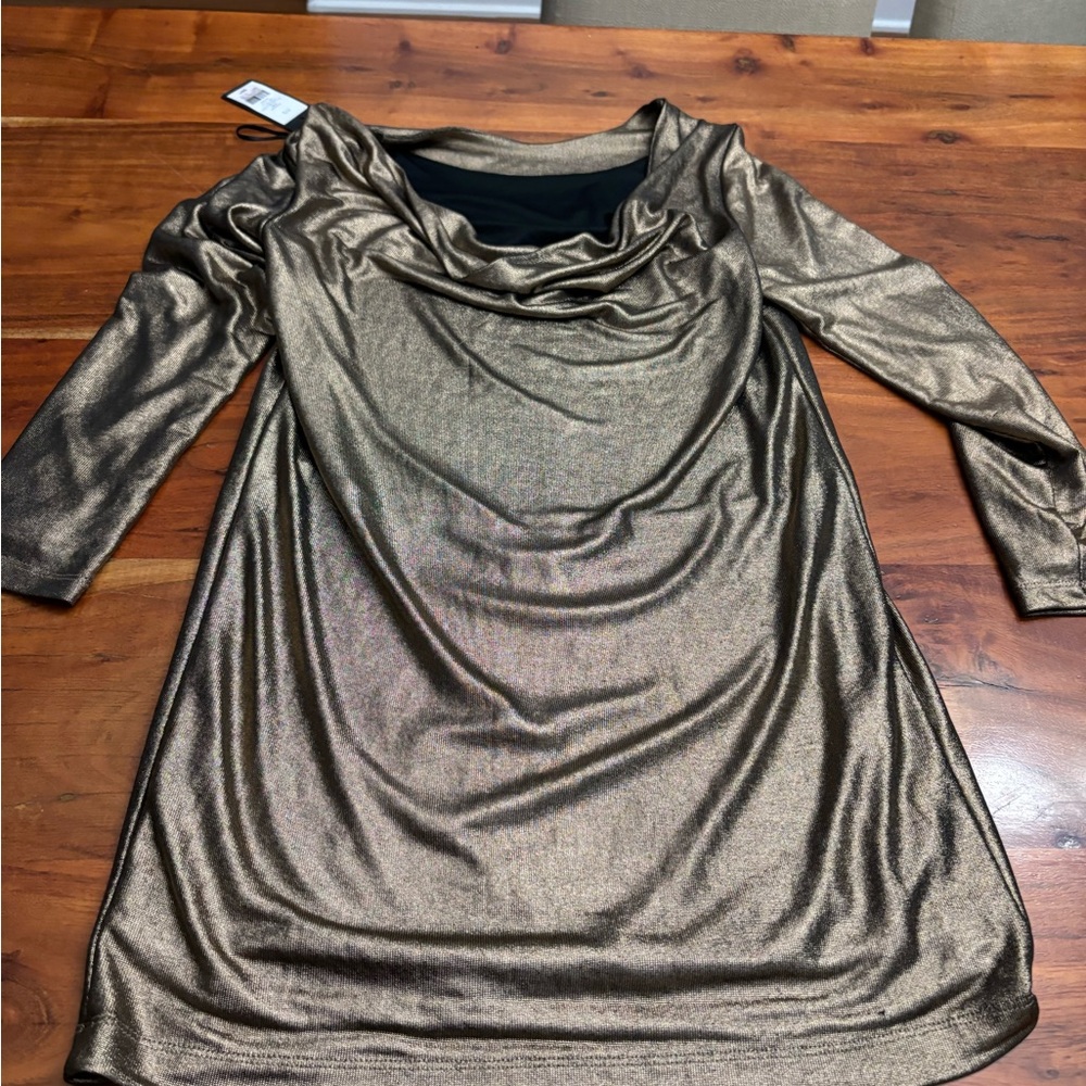 NWT gold colored party dress.  Size small but made big